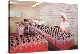 Masked Women Filling Bottles at Plant-null-Stretched Canvas