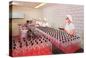 Masked Women Filling Bottles at Plant-null-Stretched Canvas