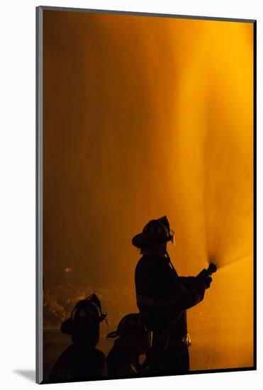 Massachusetts, Cape Ann, Fourth of July Bonfire, Silhouette of Firemen-Walter Bibikow-Mounted Photographic Print