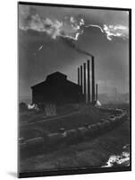 Massive Otis Steel Mill Surrounded by Tanker Cars on Railroad Track on a Cloudy Day-Margaret Bourke-White-Mounted Photographic Print