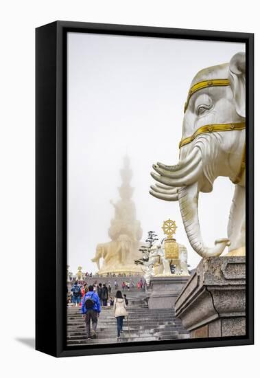 Massive statue of Samantabhadra at the summit of Mount Emei (Emei Shan), UNESCO World Heritage Site-Michael Snell-Framed Stretched Canvas