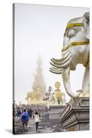 Massive statue of Samantabhadra at the summit of Mount Emei (Emei Shan), UNESCO World Heritage Site-Michael Snell-Stretched Canvas