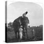 Master Ekbal Feeding an Elephant, India, 1900s-null-Stretched Canvas