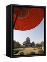 Matsumoto Castle Under Red Parasol, Nagano Prefecture, Kyoto, Japan-Christian Kober-Framed Stretched Canvas