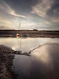 Fawley power station, a boat and a creek meandering through the mudflats all lit by a broken sky, H-Matthew Cattell-Laminated Photographic Print