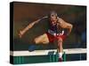 Mature Athlete Competes in Hurdles Race, Atlanta, Georgia, USA-Paul Sutton-Stretched Canvas