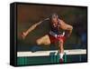 Mature Athlete Competes in Hurdles Race, Atlanta, Georgia, USA-Paul Sutton-Framed Stretched Canvas