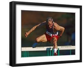 Mature Athlete Competes in Hurdles Race, Atlanta, Georgia, USA-Paul Sutton-Framed Photographic Print