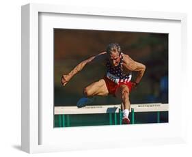 Mature Athlete Competes in Hurdles Race, Atlanta, Georgia, USA-Paul Sutton-Framed Photographic Print