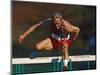 Mature Athlete Competes in Hurdles Race, Atlanta, Georgia, USA-Paul Sutton-Mounted Photographic Print