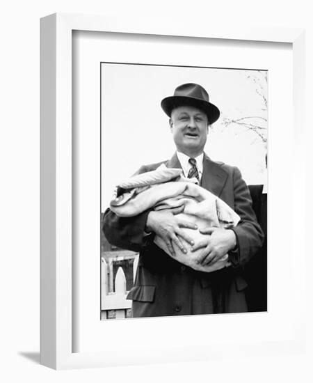 Mature Man Holds a Baby, Ca. 1950-null-Framed Photographic Print