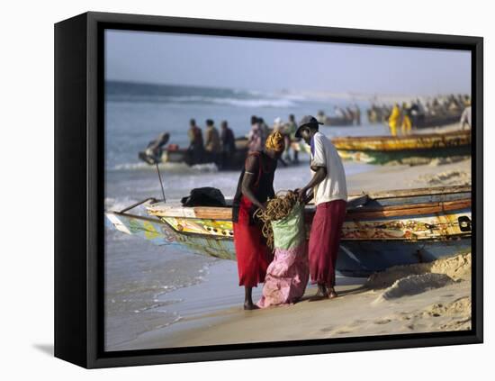 Mauritania, Nouakchott Fishermen Unload Gear from Boats Returning to Shore at Plage Des Pecheurs-Andrew Watson-Framed Stretched Canvas