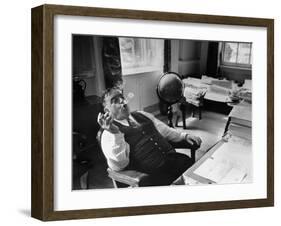 Mayor Fiorello LaGuardia Blowing Smoke Rings Sitting at Desk in His Office-William C^ Shrout-Framed Photographic Print