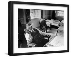 Mayor Fiorello LaGuardia Blowing Smoke Rings Sitting at Desk in His Office-William C^ Shrout-Framed Photographic Print