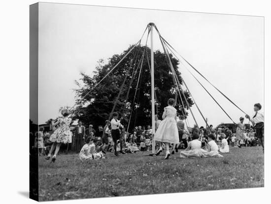 Maypole Dancing at Wishford, Wiltshire-null-Stretched Canvas