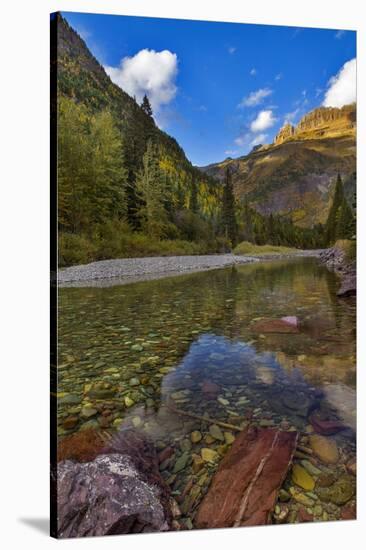 Mcdonald Creek in Autumn with Garden Wall in Glacier National Park, Montana, USA-Chuck Haney-Stretched Canvas