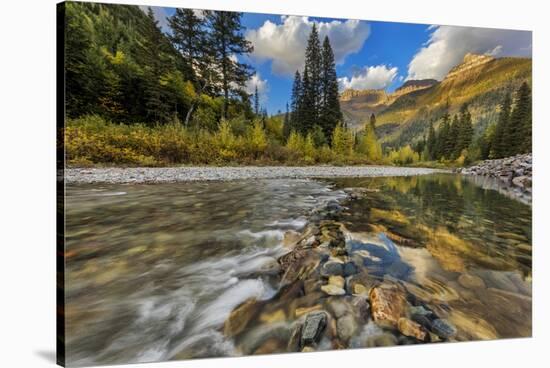 Mcdonald Creek with the Garden Wall in Glacier National Park, Montana, Usa-Chuck Haney-Stretched Canvas