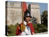 Mdina, Guard in Historic Costume of Templar Knight Stands Outside Medieval Walled City, Malta-John Warburton-lee-Stretched Canvas