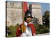 Mdina, Guard in Historic Costume of Templar Knight Stands Outside Medieval Walled City, Malta-John Warburton-lee-Stretched Canvas