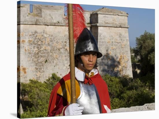 Mdina, Guard in Historic Costume of Templar Knight Stands Outside Medieval Walled City, Malta-John Warburton-lee-Stretched Canvas