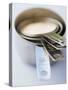 Measuring Cups of Different Sizes-Greg Elms-Stretched Canvas