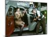 Mechanic with lady driver doing her make up, 1930s Hillman Minx-null-Mounted Photographic Print