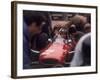 Mechanics Work on John Surtees in Ferrari During Pit Stop-null-Framed Photographic Print