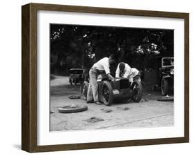Mechanics working on Leon Cushmans Austin 7 racer for a speed record attempt, Brooklands, 1931-Bill Brunell-Framed Photographic Print