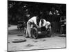 Mechanics working on Leon Cushmans Austin 7 racer for a speed record attempt, Brooklands, 1931-Bill Brunell-Mounted Photographic Print