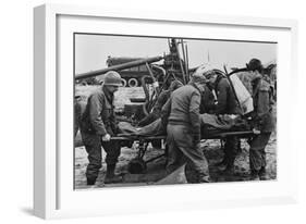 Medics Carry a Wounded U.S. Soldier Away from a Rescue Helicopter-null-Framed Photo