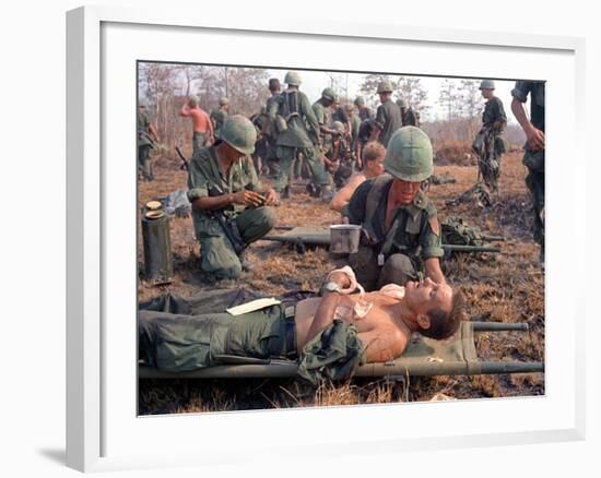 Medics Treat Wounded-Associated Press-Framed Photographic Print