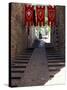 Medieval Flags Above Stone Walkway, Assisi, Umbria, Italy-Marilyn Parver-Stretched Canvas