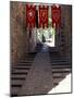 Medieval Flags Above Stone Walkway, Assisi, Umbria, Italy-Marilyn Parver-Mounted Photographic Print