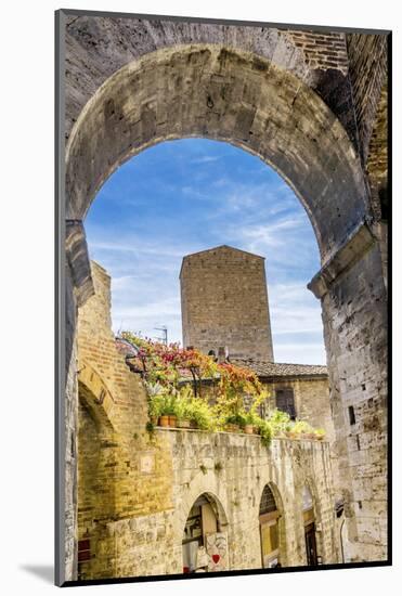 Medieval stone arch and tower, San Gimignano, Tuscany, Italy.-William Perry-Mounted Photographic Print