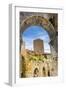 Medieval stone arch and tower, San Gimignano, Tuscany, Italy.-William Perry-Framed Photographic Print