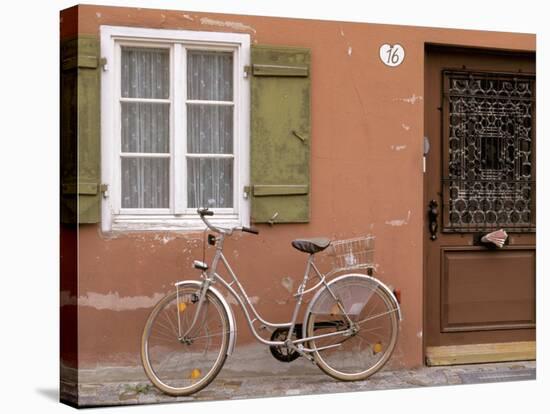 Medieval Town House and Bicycle, Romantische Strasse, Dinkelsbuhl, Bayern, Germany-Walter Bibikow-Stretched Canvas