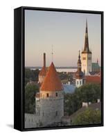 Medieval Town Walls and Spire of St. Olav's Church at Dusk, Tallinn, Estonia, Baltic States-Neale Clarke-Framed Stretched Canvas