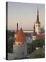 Medieval Town Walls and Spire of St. Olav's Church at Dusk, Tallinn, Estonia, Baltic States-Neale Clarke-Stretched Canvas