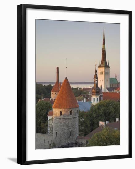 Medieval Town Walls and Spire of St. Olav's Church at Dusk, Tallinn, Estonia, Baltic States-Neale Clarke-Framed Photographic Print