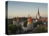 Medieval Town Walls and Spire of St. Olavs Church at Dusk, Tallinn, Estonia, Baltic States, Europe-Neale Clarke-Stretched Canvas