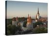 Medieval Town Walls and Spire of St. Olavs Church at Dusk, Tallinn, Estonia, Baltic States, Europe-Neale Clarke-Stretched Canvas