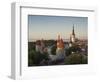 Medieval Town Walls and Spire of St. Olavs Church at Dusk, Tallinn, Estonia, Baltic States, Europe-Neale Clarke-Framed Photographic Print