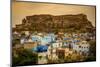 Mehrangarh Fort Towering over the Blue Rooftops in Jodhpur, the Blue City, Rajasthan, India, Asia-Laura Grier-Mounted Photographic Print