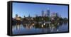 Melbourne skyline along Yarra River at dusk, Melbourne, Victoria, Australia-Ian Trower-Framed Stretched Canvas