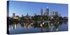 Melbourne skyline along Yarra River at dusk, Melbourne, Victoria, Australia-Ian Trower-Stretched Canvas