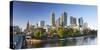 Melbourne skyline along Yarra River, Melbourne, Victoria, Australia-Ian Trower-Stretched Canvas