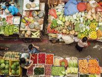 Colourful produce of peppers, garlic, onions, peanuts and shallots, at a market in Denpasar, Bali,-Melissa Kuhnell-Photographic Print
