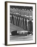 Member of Honor Guard Lying on the Ground After Fainting During Ceremonies For Queen Elizabeth-John Loengard-Framed Photographic Print