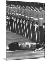 Member of Honor Guard Lying on the Ground After Fainting During Ceremonies For Queen Elizabeth-John Loengard-Mounted Photographic Print