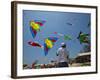 Member of Indonesia Kite Team Flies Kite with Series of Colorful Bird Sales, Vung Tau City, Vietnam-null-Framed Photographic Print